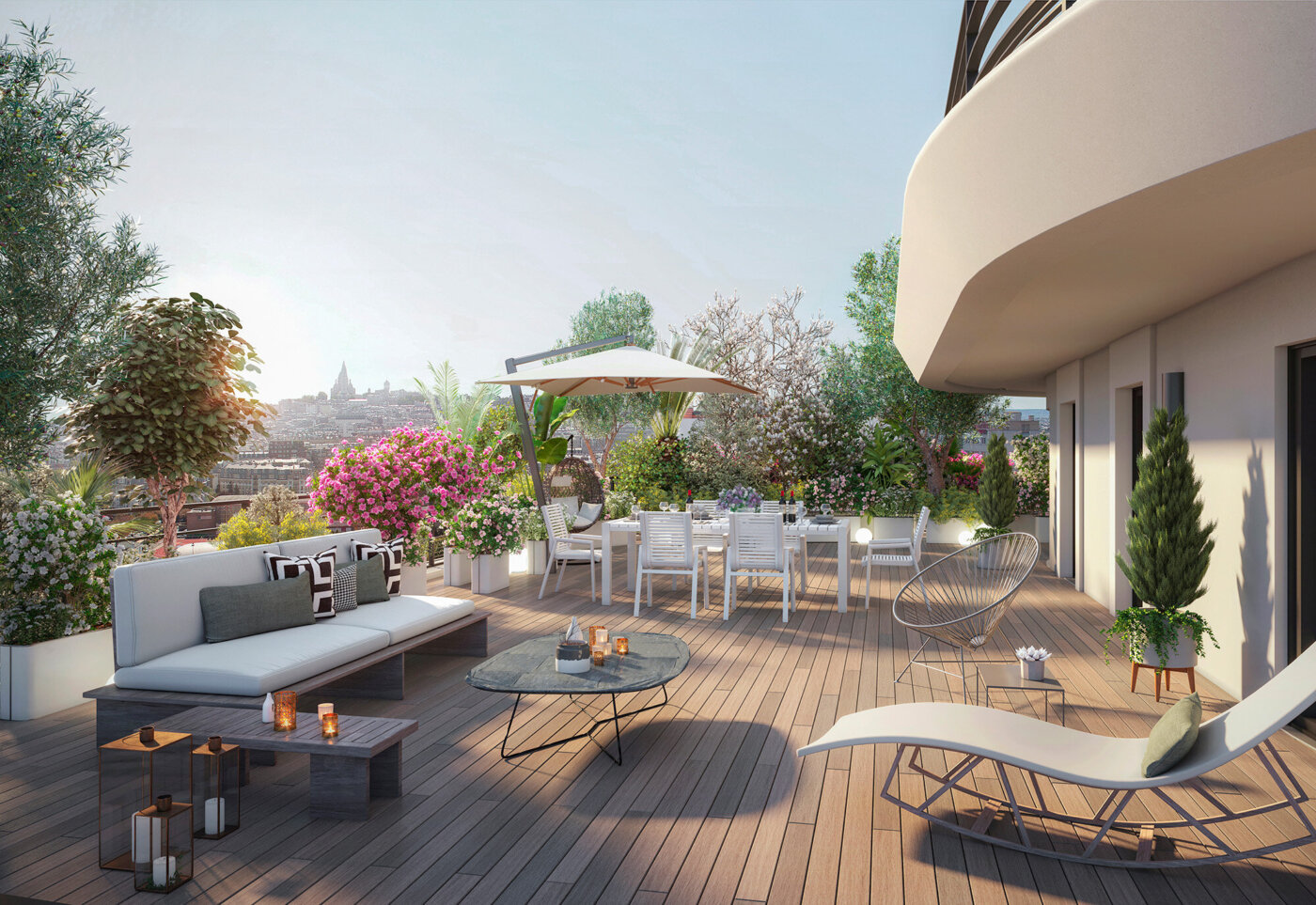 Une terrasse en attique du Village des Rosiers à Saint-Ouen, avec vue sur le Sacré-Cœur