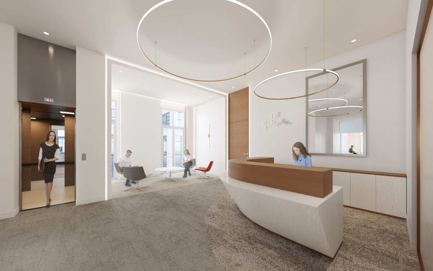 Le hall d’accueil du 178 rue Montmartre à Paris, banque courbe en bois et suspensions annulaires en laiton