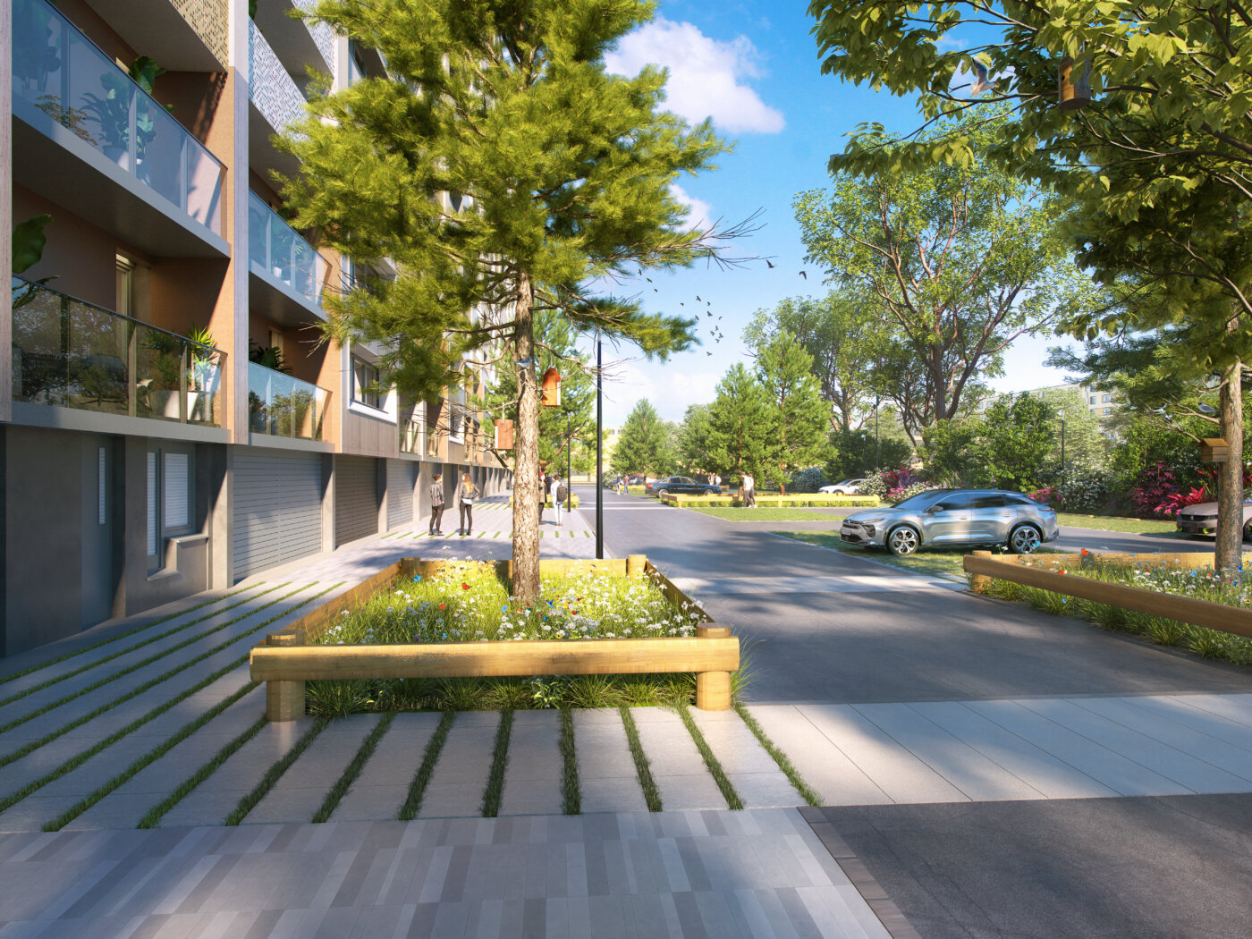 Pied d’immeuble à Bagneux : bande plantée bordée de bois, pavage à joints engazonnés et pin conservé