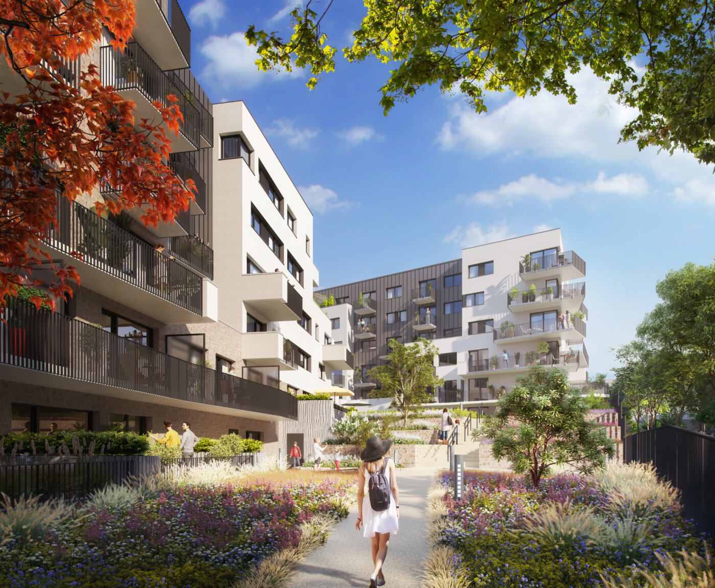 Cheminement planté entre les deux bâtiments de la résidence Rive Gauche à Lagny-sur-Marne, balcons et loggias