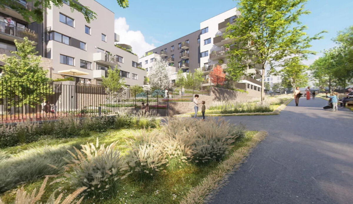 La résidence Rive Gauche : façades sur rue, cheminement piéton et noues plantées
